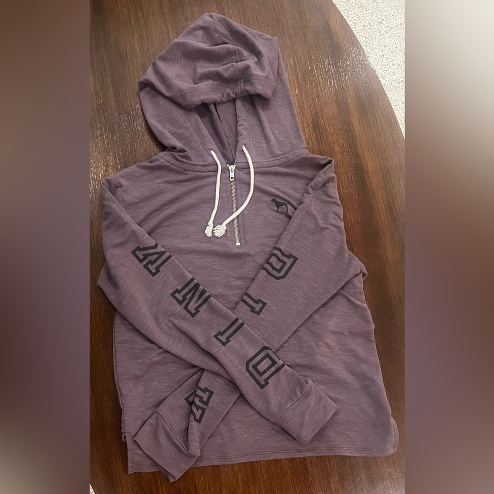 Pink sip up jacket with hood. Used but in good condition.